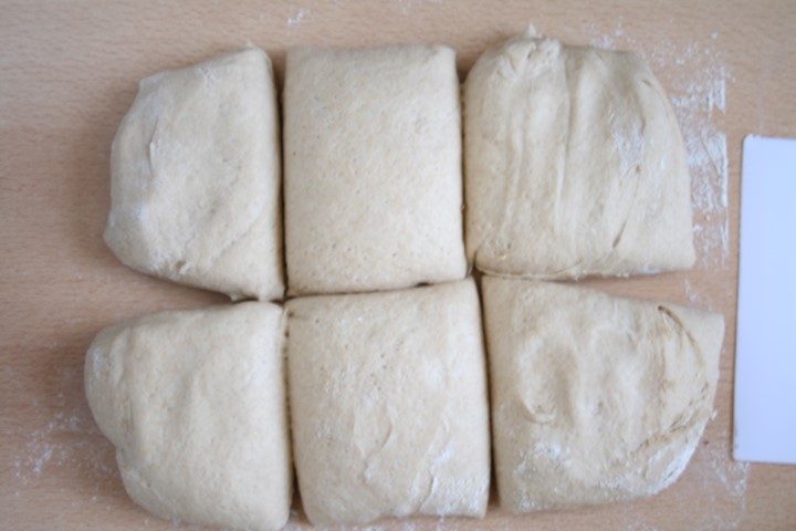 cutting the bagel dough