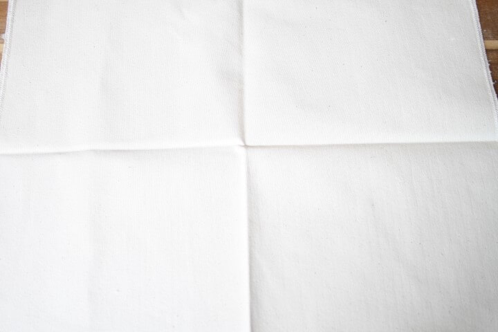 הכנת בד כותנה חדש לשימוש ראשוני